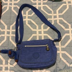 Vintage Kipling Blue Crossbody Purse. Pre loved condition